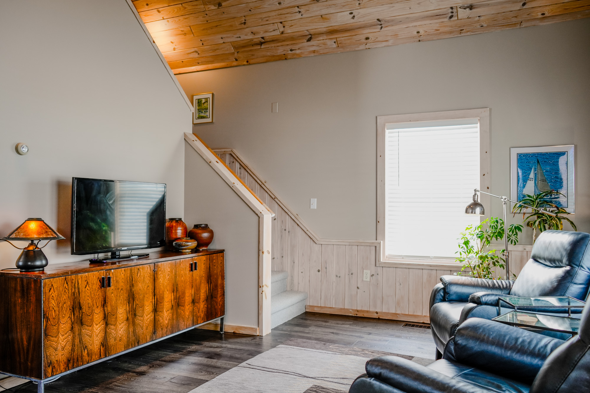 Living room with staircase to loft